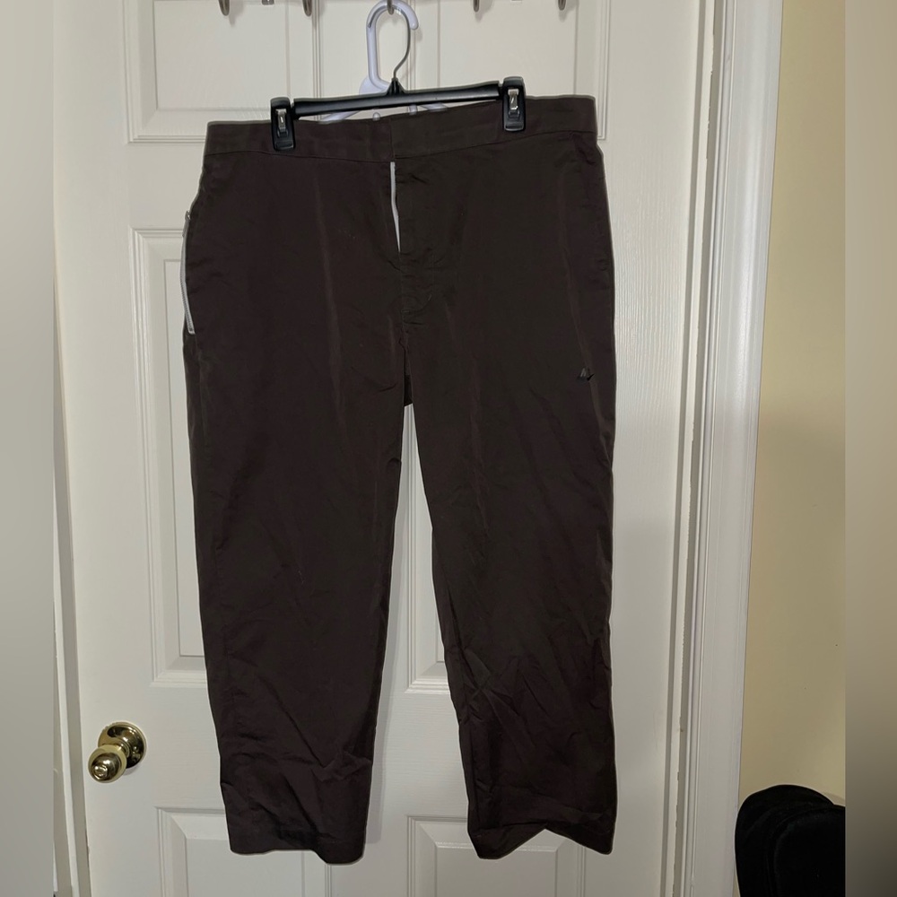 Cropped Nike pants.